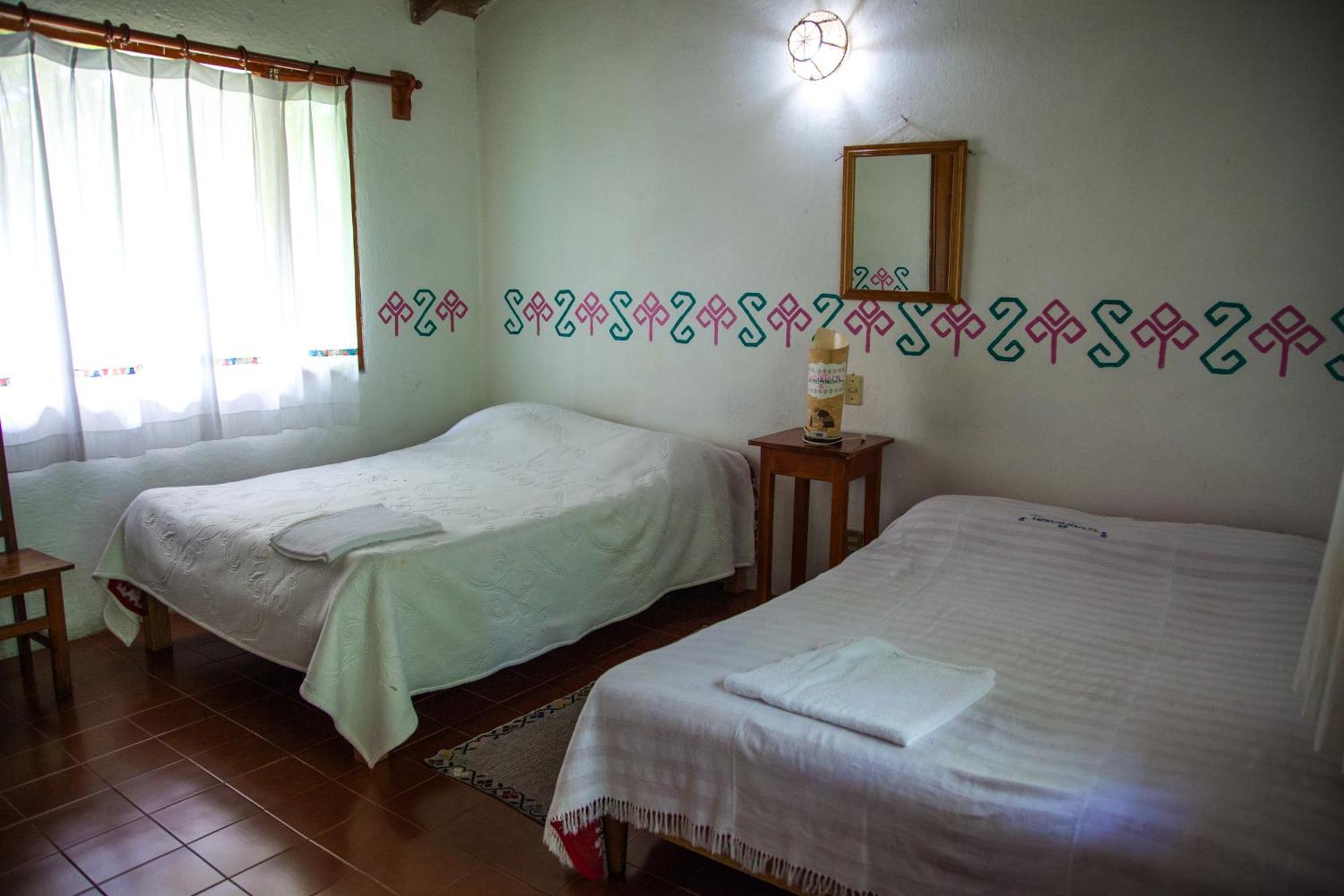 Hotel Taselotzin คูเอตซาลันเดลโปรเกรโซ ภายนอก รูปภาพ